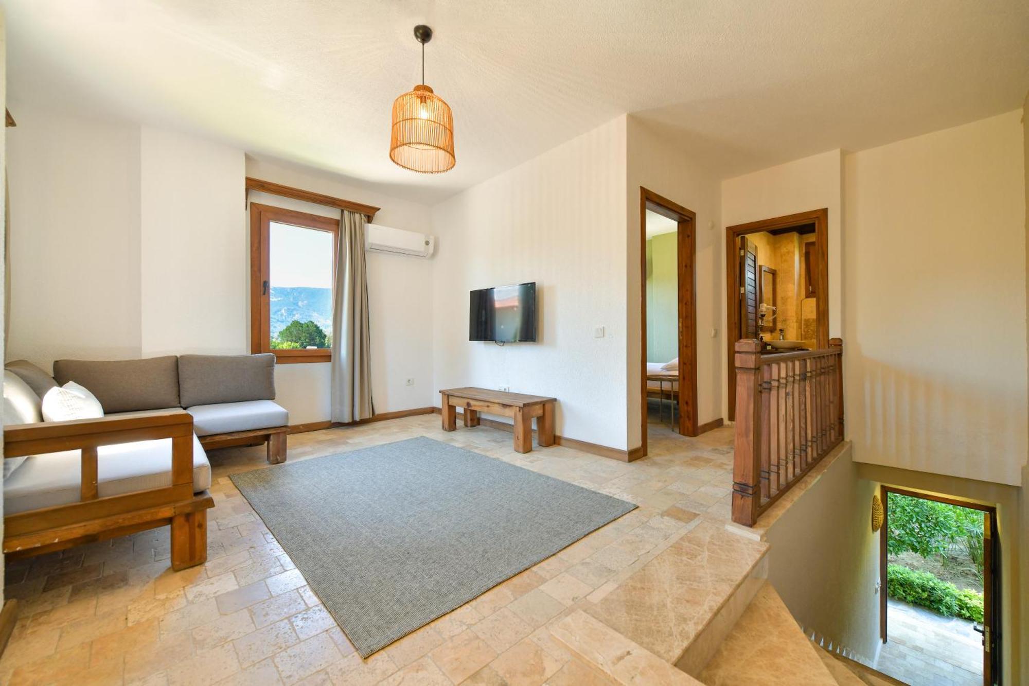 Okapi Suites Ula 外观 照片